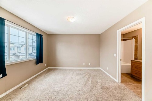 207-620 Luxstone Landing Sw, Airdrie, AB - Indoor Photo Showing Other Room