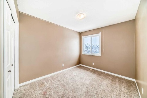 207-620 Luxstone Landing Sw, Airdrie, AB - Indoor Photo Showing Other Room
