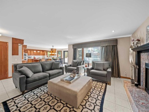 146 Edgeview Road Nw, Calgary, AB - Indoor Photo Showing Living Room With Fireplace