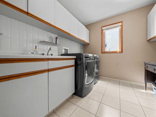 146 Edgeview Road Nw, Calgary, AB - Indoor Photo Showing Laundry Room