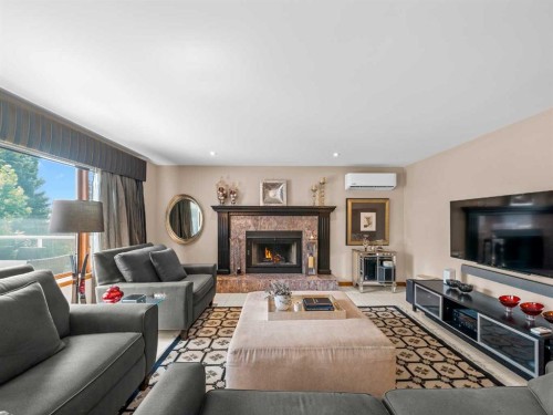 146 Edgeview Road Nw, Calgary, AB - Indoor Photo Showing Living Room With Fireplace
