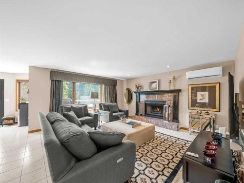 146 Edgeview Road Nw, Calgary, AB - Indoor Photo Showing Living Room With Fireplace
