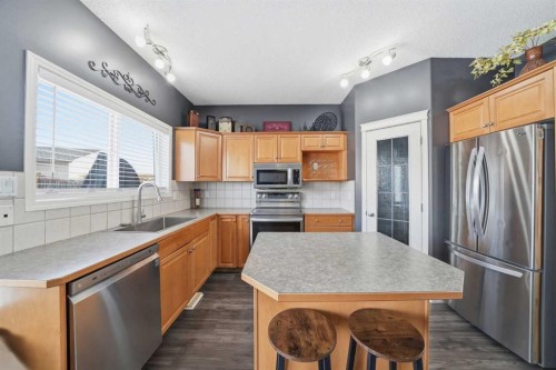 74 Cranberry Close Se, Calgary, AB - Indoor Photo Showing Kitchen With Stainless Steel Kitchen
