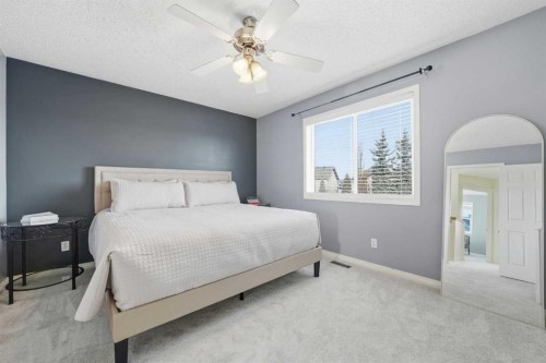 74 Cranberry Close Se, Calgary, AB - Indoor Photo Showing Bedroom