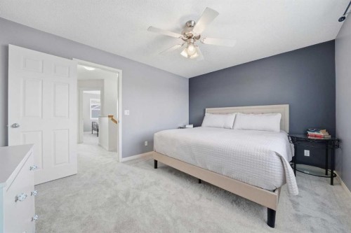 74 Cranberry Close Se, Calgary, AB - Indoor Photo Showing Bedroom