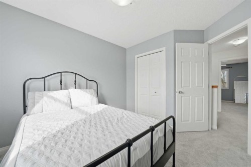 74 Cranberry Close Se, Calgary, AB - Indoor Photo Showing Bedroom