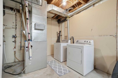 74 Cranberry Close Se, Calgary, AB - Indoor Photo Showing Laundry Room