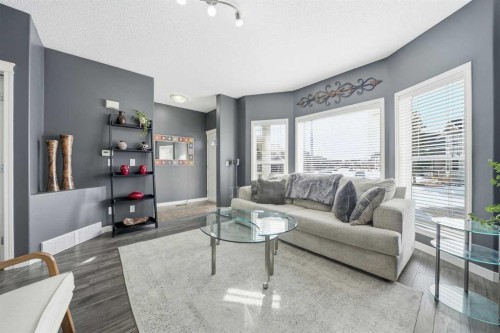 74 Cranberry Close Se, Calgary, AB - Indoor Photo Showing Living Room