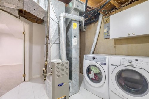 217 Aboyne Place Ne, Calgary, AB - Indoor Photo Showing Laundry Room