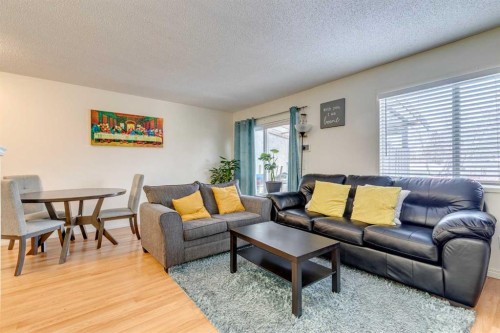 217 Aboyne Place Ne, Calgary, AB - Indoor Photo Showing Living Room