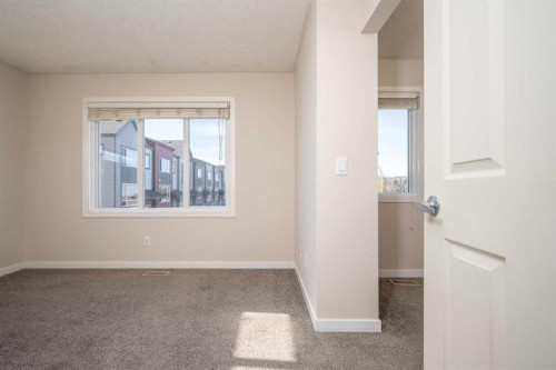 203 Copperstone Park Se, Calgary, AB - Indoor Photo Showing Other Room