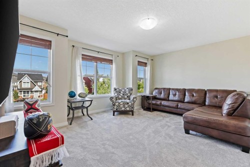 415 Auburn Bay Avenue Se, Calgary, AB - Indoor Photo Showing Living Room