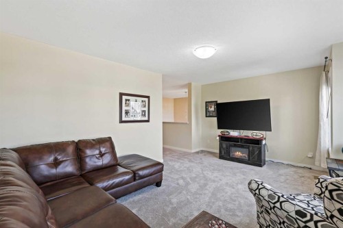 415 Auburn Bay Avenue Se, Calgary, AB - Indoor Photo Showing Living Room
