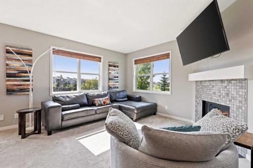 415 Auburn Bay Avenue Se, Calgary, AB - Indoor Photo Showing Living Room With Fireplace