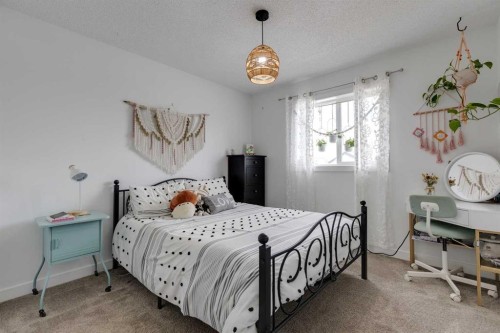 112 Fireside Drive, Cochrane, AB - Indoor Photo Showing Bedroom