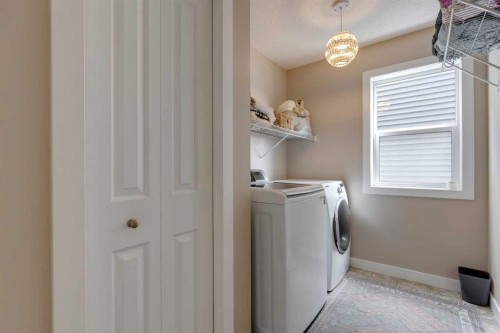 112 Fireside Drive, Cochrane, AB - Indoor Photo Showing Laundry Room