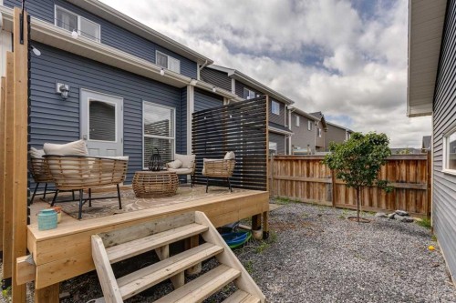 112 Fireside Drive, Cochrane, AB - Outdoor With Deck Patio Veranda