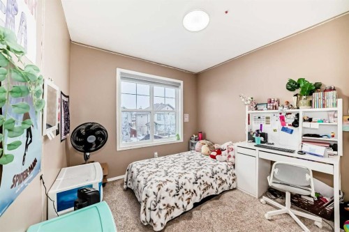 32 Saddlebrook Place Ne, Calgary, AB - Indoor Photo Showing Bedroom
