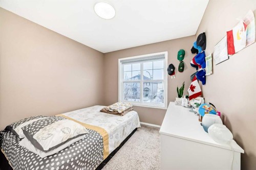 32 Saddlebrook Place Ne, Calgary, AB - Indoor Photo Showing Bedroom