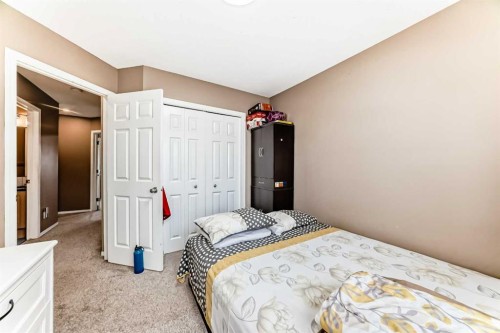 32 Saddlebrook Place Ne, Calgary, AB - Indoor Photo Showing Bedroom
