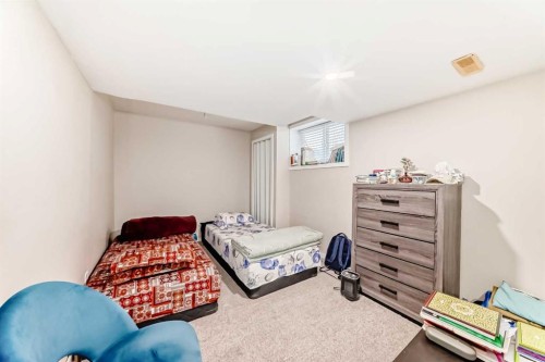 32 Saddlebrook Place Ne, Calgary, AB - Indoor Photo Showing Bedroom