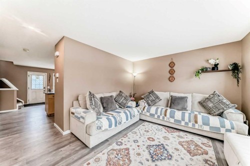32 Saddlebrook Place Ne, Calgary, AB - Indoor Photo Showing Living Room