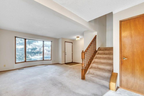 56 Cedarwood Hill Sw, Calgary, AB - Indoor Photo Showing Other Room