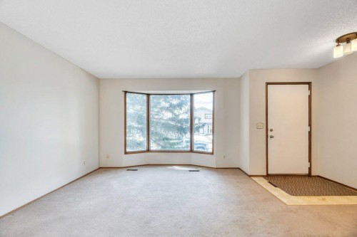 56 Cedarwood Hill Sw, Calgary, AB - Indoor Photo Showing Other Room
