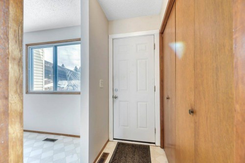 56 Cedarwood Hill Sw, Calgary, AB - Indoor Photo Showing Other Room