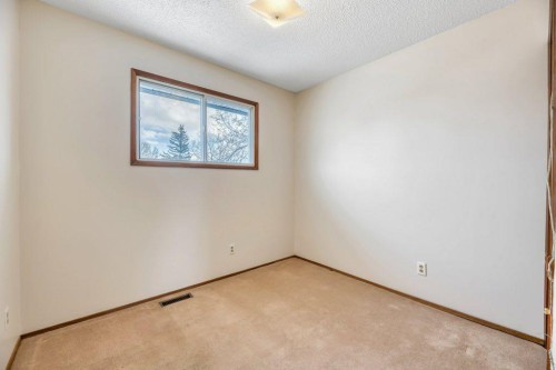 56 Cedarwood Hill Sw, Calgary, AB - Indoor Photo Showing Other Room