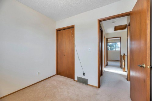 56 Cedarwood Hill Sw, Calgary, AB - Indoor Photo Showing Other Room
