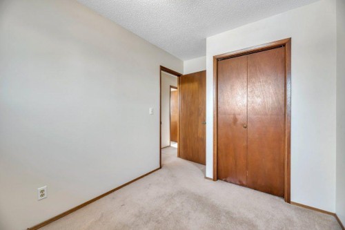 56 Cedarwood Hill Sw, Calgary, AB - Indoor Photo Showing Other Room