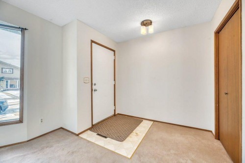 56 Cedarwood Hill Sw, Calgary, AB - Indoor Photo Showing Other Room