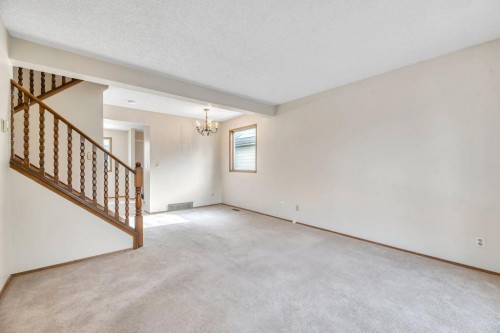 56 Cedarwood Hill Sw, Calgary, AB - Indoor Photo Showing Other Room