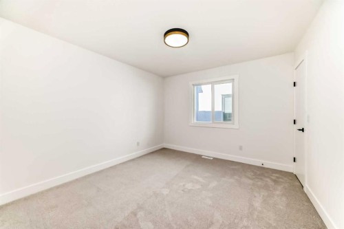 28 Saddlecrest Manor Ne, Calgary, AB - Indoor Photo Showing Other Room