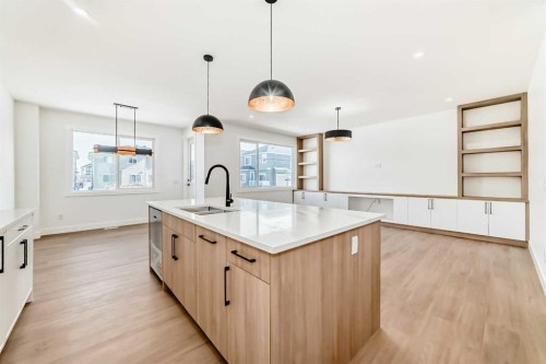 28 Saddlecrest Manor Ne, Calgary, AB - Indoor Photo Showing Kitchen With Double Sink