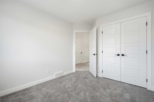596 Buffaloberry Manor Se, Calgary, AB - Indoor Photo Showing Other Room