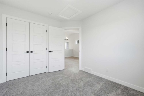 596 Buffaloberry Manor Se, Calgary, AB - Indoor Photo Showing Other Room