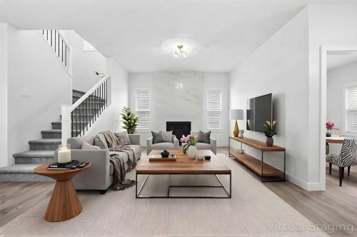 596 Buffaloberry Manor Se, Calgary, AB - Indoor Photo Showing Living Room