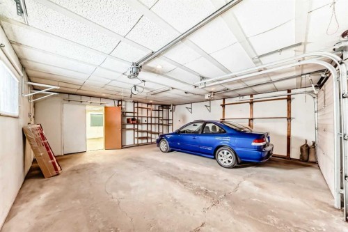 8423 Addison Drive Se, Calgary, AB - Indoor Photo Showing Garage