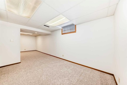 8423 Addison Drive Se, Calgary, AB - Indoor Photo Showing Other Room