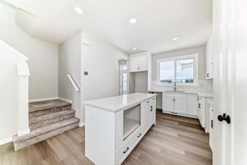 31 Blue Heron Parade Se, Calgary, AB - Indoor Photo Showing Kitchen