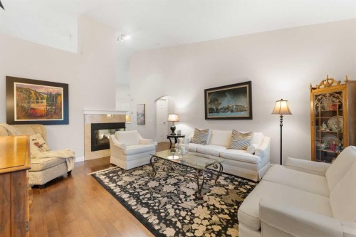 71 Chaparral Close Se, Calgary, AB - Indoor Photo Showing Living Room With Fireplace