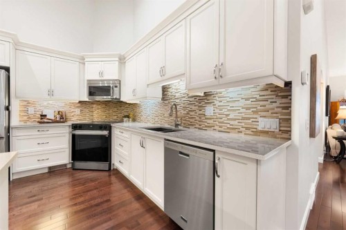 71 Chaparral Close Se, Calgary, AB - Indoor Photo Showing Kitchen With Double Sink With Upgraded Kitchen