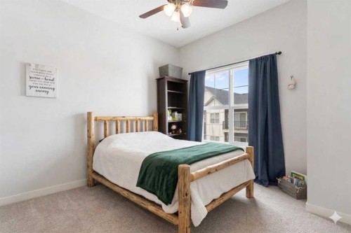 408-250 Fireside View, Cochrane, AB - Indoor Photo Showing Bedroom