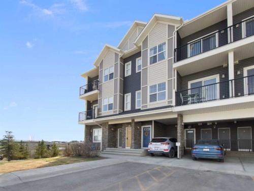 408-250 Fireside View, Cochrane, AB - Outdoor With Balcony With Facade