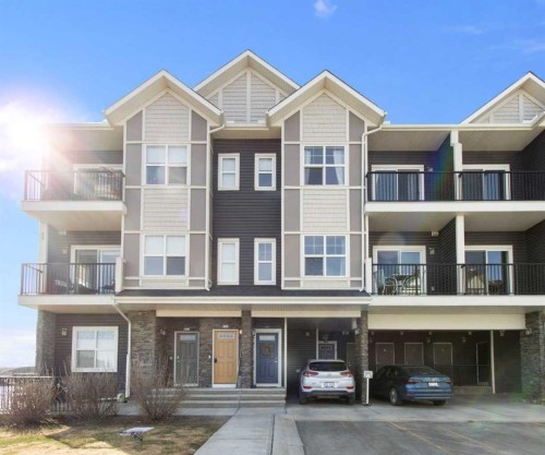 408-250 Fireside View, Cochrane, AB - Outdoor With Balcony With Facade