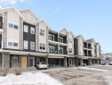 408-250 Fireside View, Cochrane, AB  - Outdoor With Balcony With Facade 