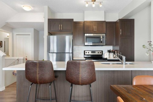 408-250 Fireside View, Cochrane, AB - Indoor Photo Showing Kitchen