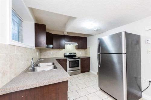 422 Taralake Way Ne, Calgary, AB - Indoor Photo Showing Kitchen With Double Sink